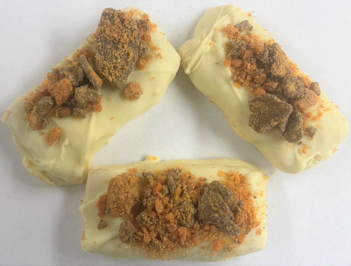 Scott's Cakes White Chocolate Covered Graham Crackers Topped w/ Ground Butterfinger in a 1 Pound Bakery Box